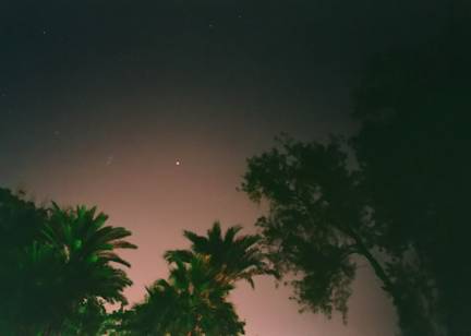 Red Planet and Trees - by: Aymen Ibrahem (Canon 28mm, F2.8, 20 second exposure, Kodak Ultra 400)