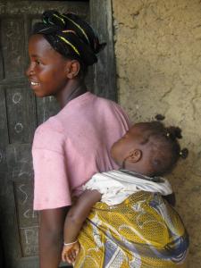 Jong meisje met kind