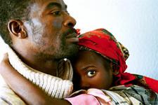 Local hospital In the waiting room, parents with sick children. Marracuene, Mozambique. Photo: Eric Miller/ World Bank