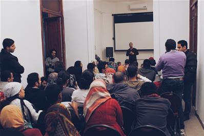 Participants attending a film screening at Medrar foundation for for contemporary art