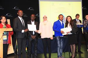 Dr Marwa El sahn, Paul Katassoli, Stéphane N'guessan Kouadio Christian Elongue avec les participants