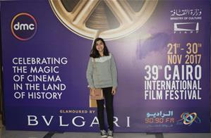  Avec l'affiche du festival à l'Opéra du Caire