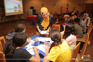 Les participants du 3<sup>e</sup> groupe avec Heba Elghitany,l'animatrice de l'atelier de jeu