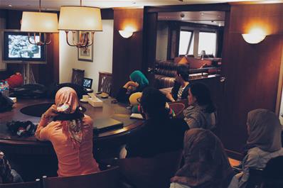 Participants attending film screening with mentors on board