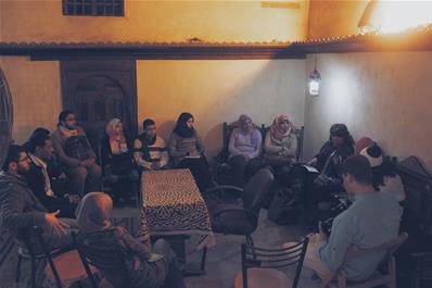 Writers meeting with their mentors at Bayt Al-Sinnari