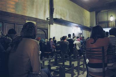 Participants attending a lecture by Dr. Haitham Nawar, at Bayt Al-Sinnari